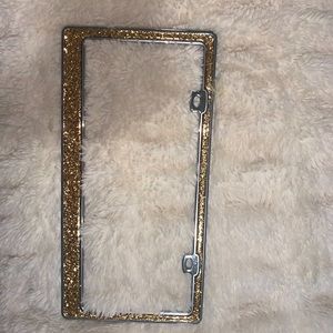 Gold sparkly license plate cover
